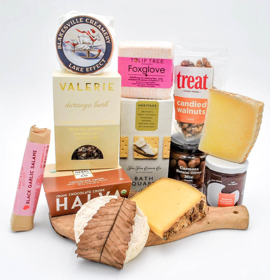 The Lincoln gift basket with cheese, preserves, chocolate, nuts, crackers, salami, olives, halva