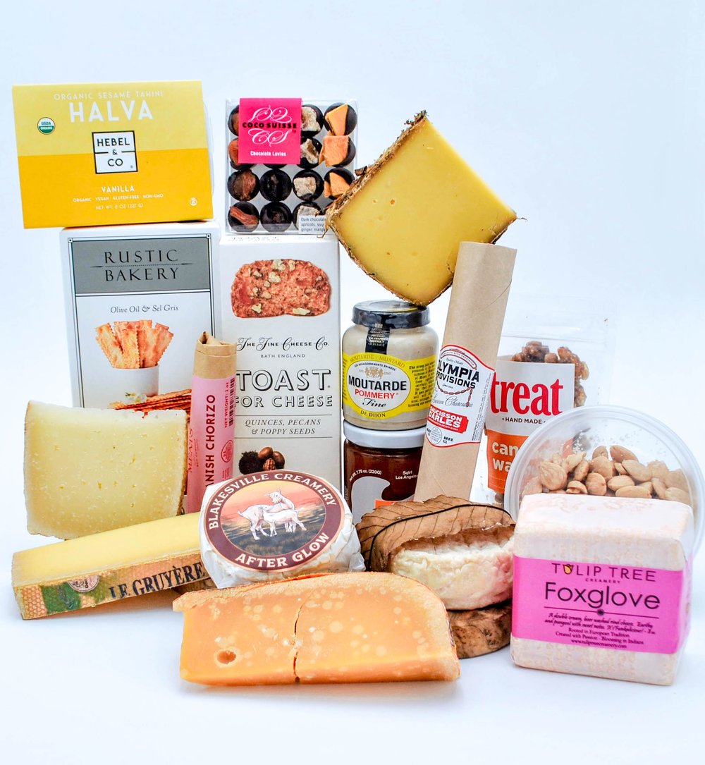 The Wilshire gift basket with cheese, preserves, chocolate, nuts, crackers, salami, halva, mustard, almonds